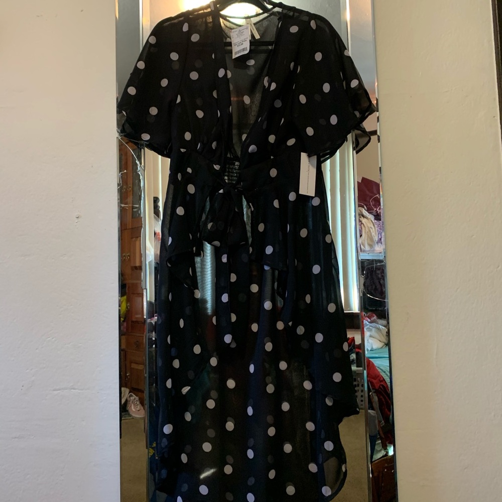 A black Polkadot blouse